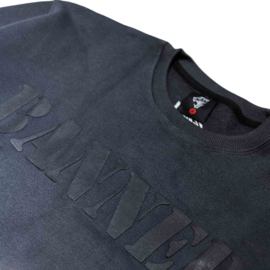 Dark gray sweatshirt with 'BANNED' text on a white background
